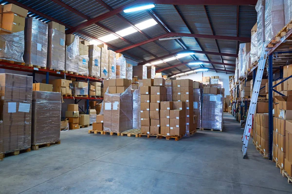 Neatly stacked labeled boxes inside a climate-controlled storage facility