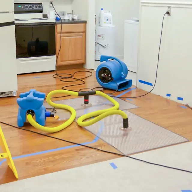 Specialized floor drying mat system saving soaked hardwood flooring
